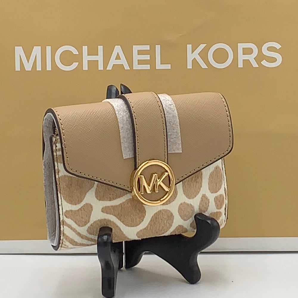 MICHAEL KORS
Carmen Medium Flap Bifold Faux Fur-Leather Wallet
Camel color